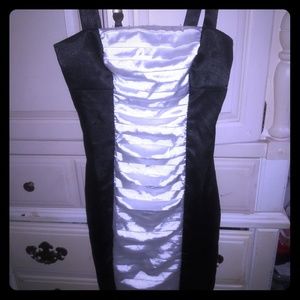 Very classy dress.  Black w/white down the center